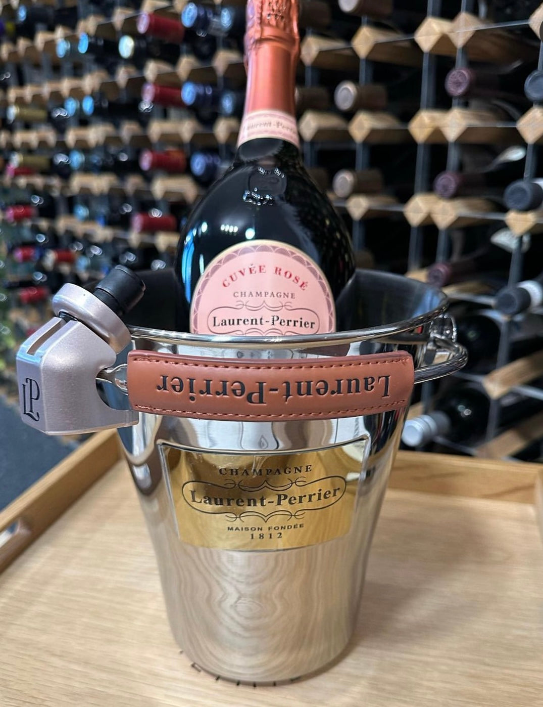 Laurent Perrier Rosé + 2 LPR branded Crystal champagne flutes, LPR bottle stopper, LPR stainless steel ice bucket with leather handle and gold plaque - Bodega Movil