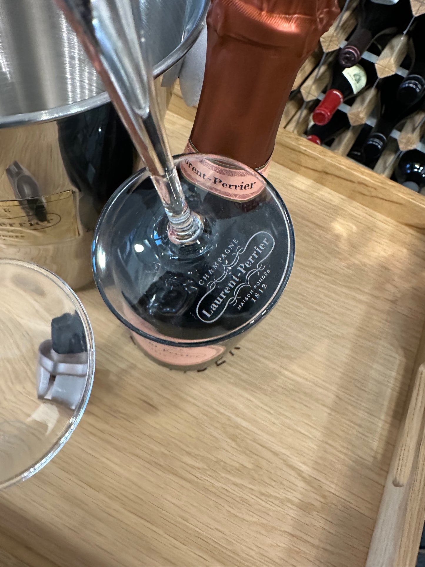Laurent Perrier Rosé + 2 LPR branded Crystal champagne flutes, LPR bottle stopper, LPR stainless steel ice bucket with leather handle and gold plaque - Bodega Movil